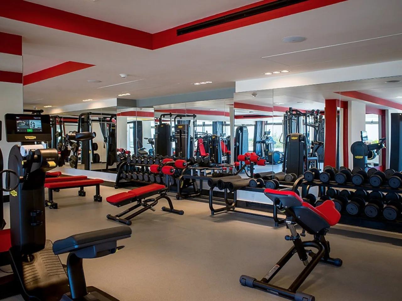 Fitness center with free weights and machines