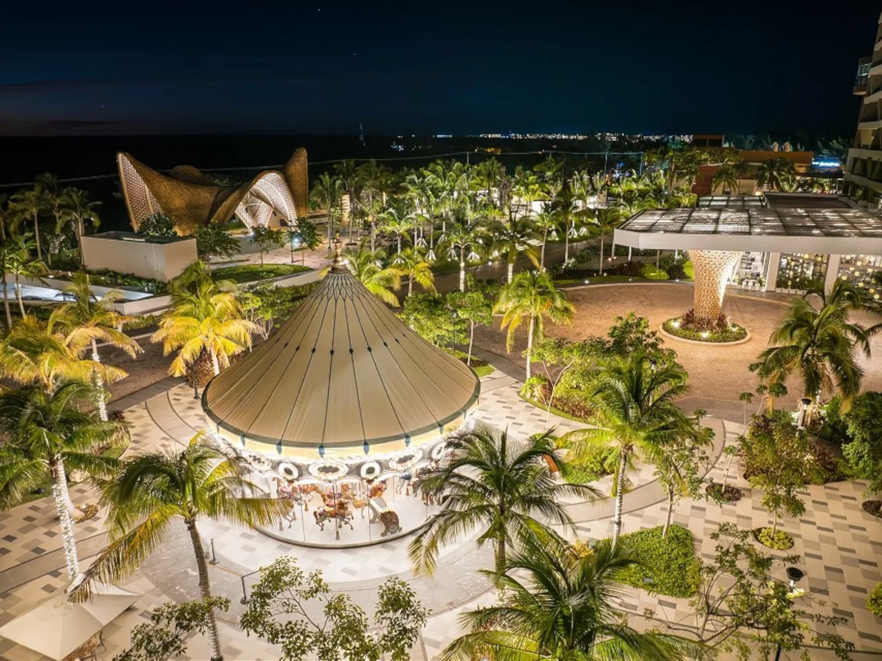 Resort gardens illuminated at night