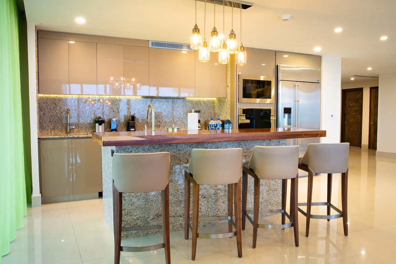 Kitchen with breakfast bar and upscale appliances