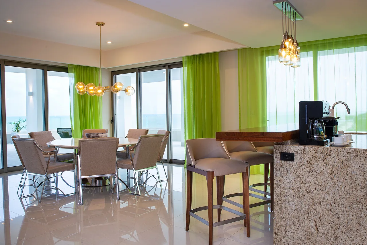Dining area with floor-to-ceiling sea views