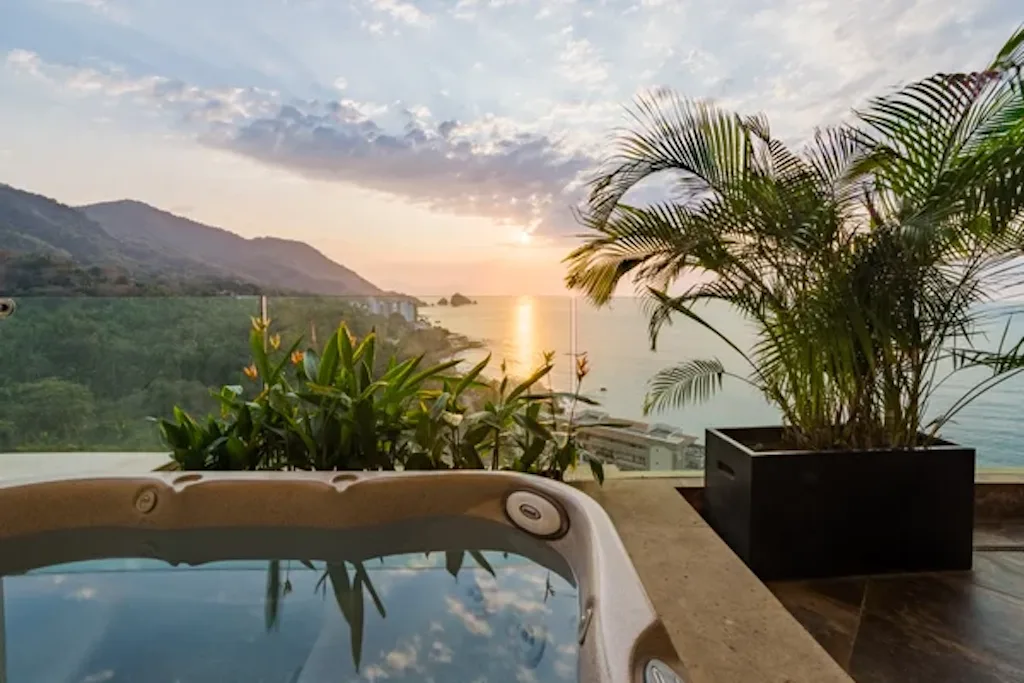 Private master jacuzzi overlooking Banderas Bay at sunset