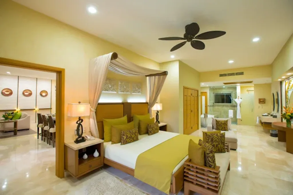 Master bedroom with canopy king bed