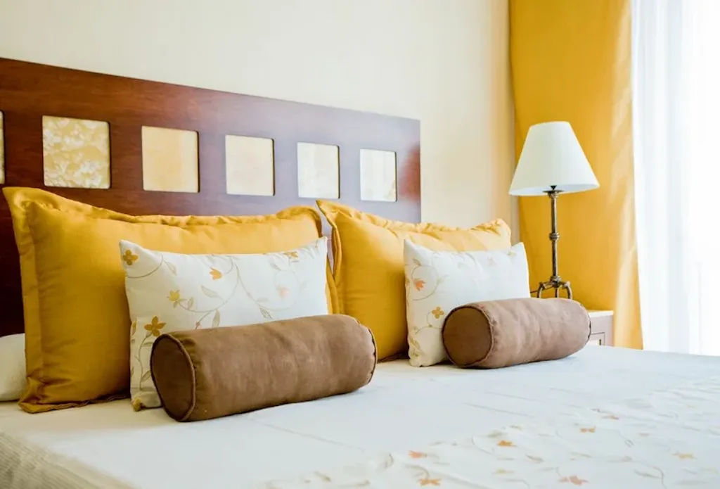 Plush bedding with embroidered linens